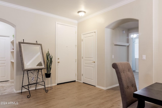 office area featuring crown molding and light hardwood / wood-style floors