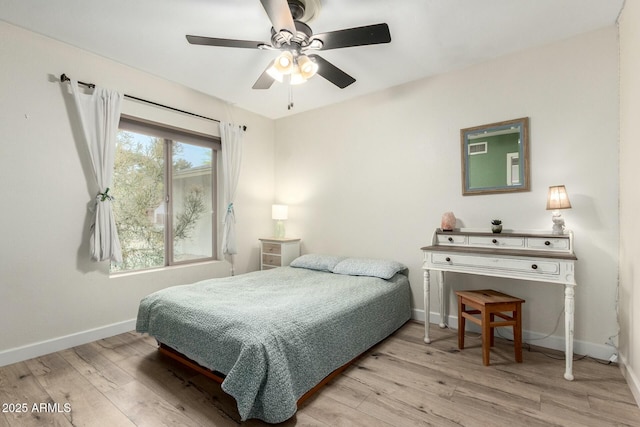 5253 E Waltann Ln, Scottsdale, AZ 85254 - bedroom with baseboards, a ceiling fan, and wood finished floors