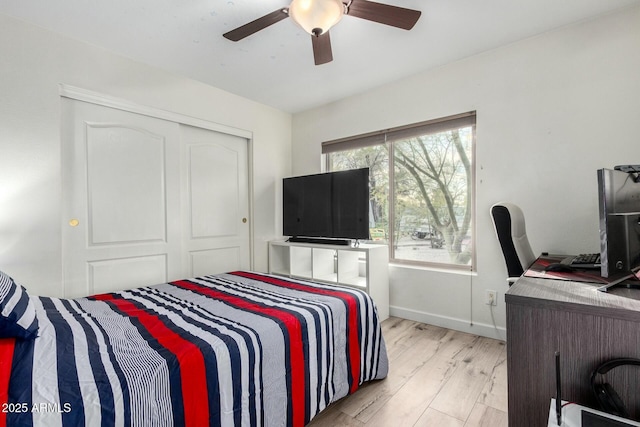 5253 E Waltann Ln, Scottsdale, AZ 85254 - bedroom with a closet, baseboards, a ceiling fan, and wood finished floors