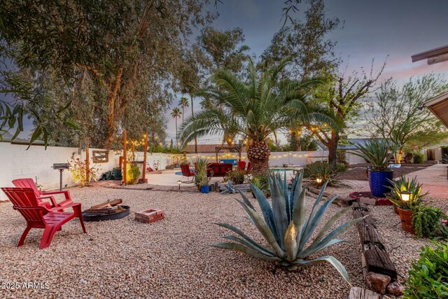 5253 E Waltann Ln, Scottsdale, AZ 85254 - view of yard featuring a fenced backyard, a fire pit, and a patio