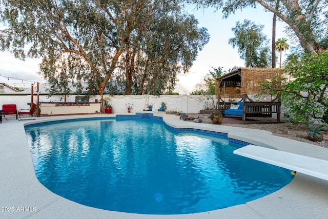 5253 E Waltann Ln, Scottsdale, AZ 85254 - view of pool with a fenced in pool, a patio area, a fenced backyard, and a diving board
