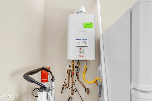 utility room with water heater