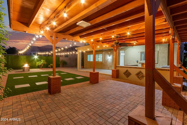 view of patio / terrace featuring fence