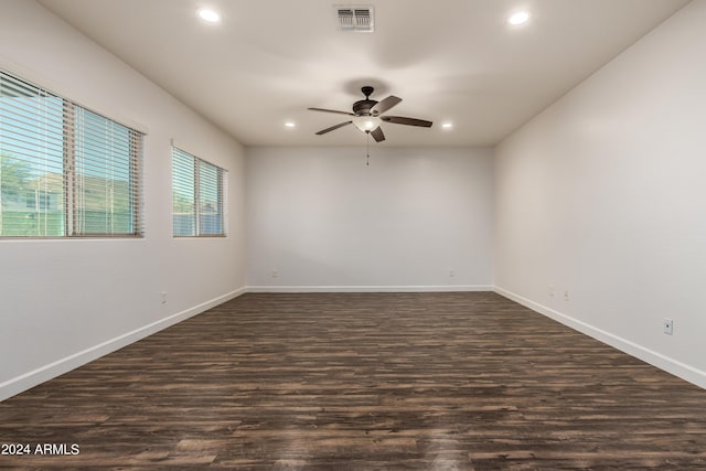 spare room featuring dark wood-style floors, visible vents, recessed lighting, and ceiling fan