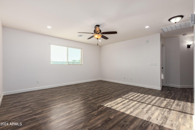 unfurnished room featuring visible vents, recessed lighting, baseboards, and wood finished floors