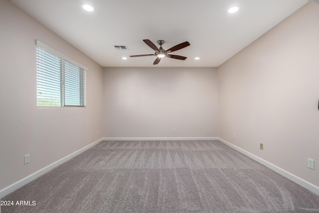 carpeted empty room with recessed lighting, visible vents, baseboards, and ceiling fan