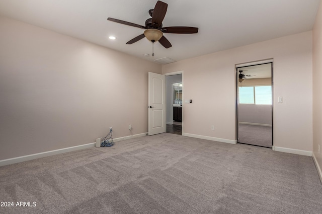 empty room with a ceiling fan, recessed lighting, carpet, and baseboards