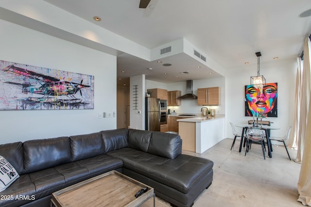 living room featuring recessed lighting