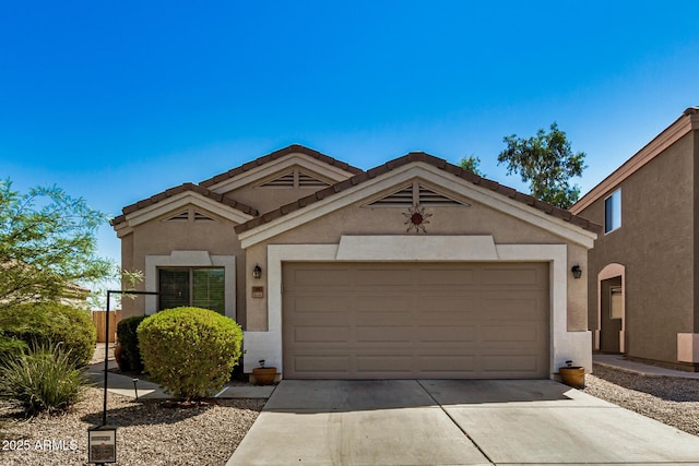 view of front of property with a garage