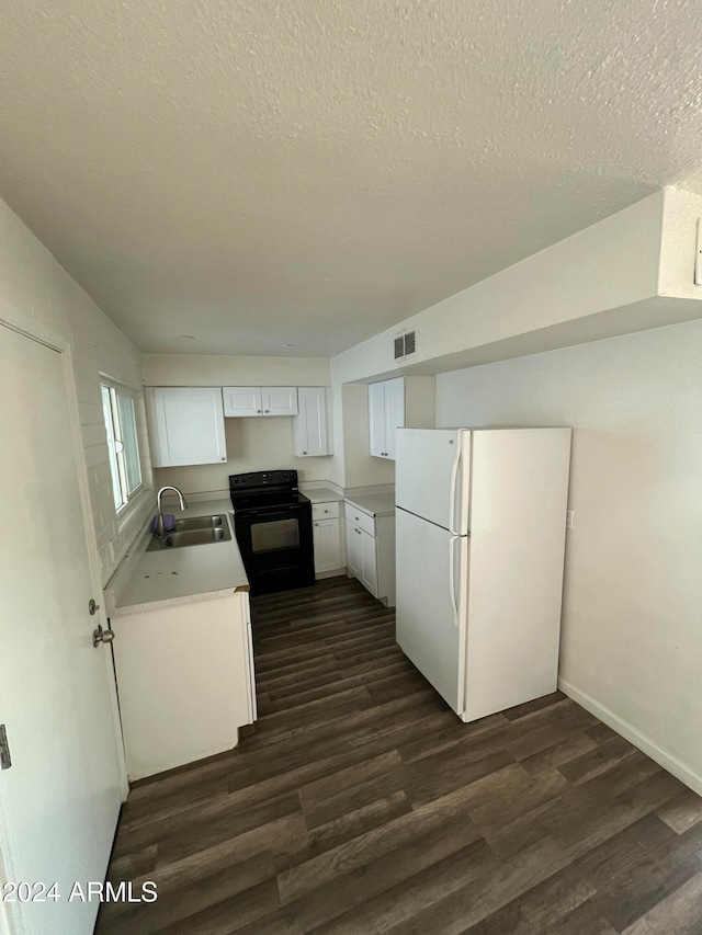 kitchen with white cabinetry, black range with electric stovetop, dark hardwood / wood-style flooring, and white fridge