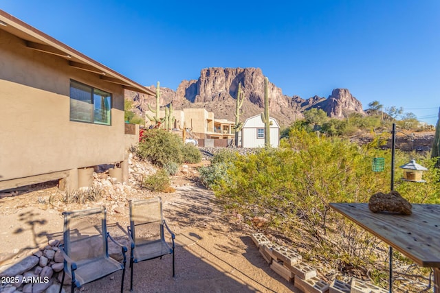 view of patio / terrace featuring a mountain view