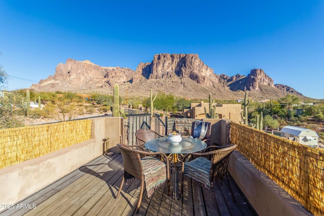 wooden terrace with a mountain view