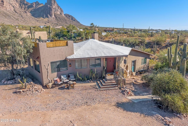 view of front of house with a mountain view