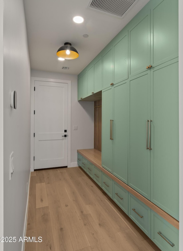 10220 N 66th St, Paradise Valley, AZ 85253 - mudroom featuring light wood finished floors, baseboards, and visible vents