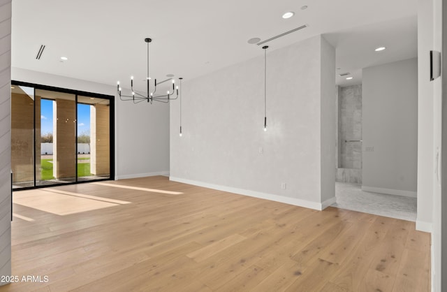 10220 N 66th St, Paradise Valley, AZ 85253 - interior space featuring baseboards, a notable chandelier, light wood-style floors, and recessed lighting