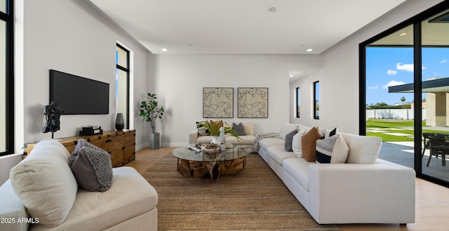 10220 N 66th St, Paradise Valley, AZ 85253 - living room with light wood-type flooring, recessed lighting, and a healthy amount of sunlight