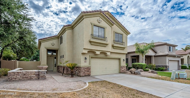 view of front of home with a garage