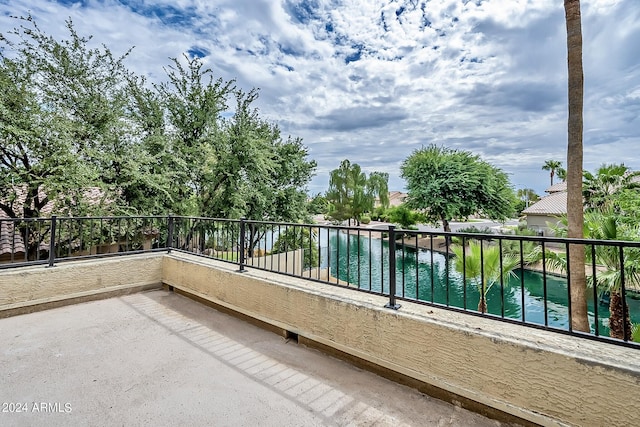 view of pool featuring a water view