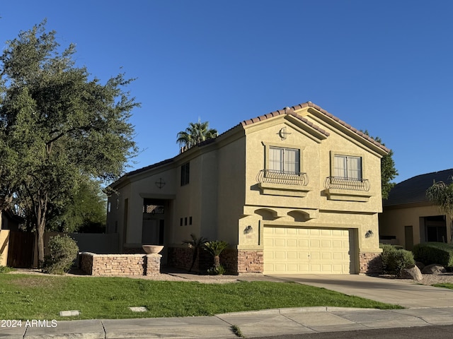 mediterranean / spanish-style house with an attached garage, driveway, stone siding, a tiled roof, and stucco siding