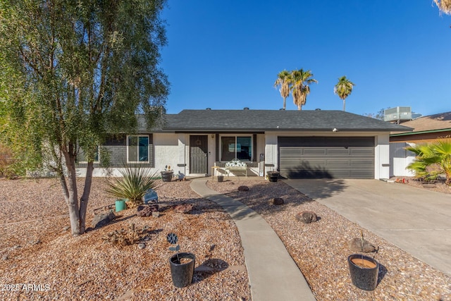 ranch-style home featuring a garage