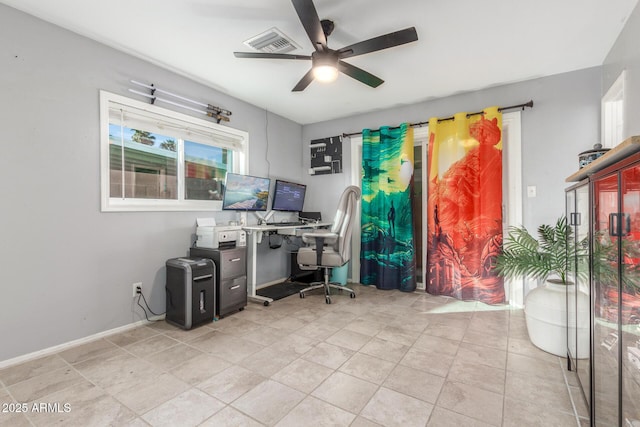 office space with ceiling fan