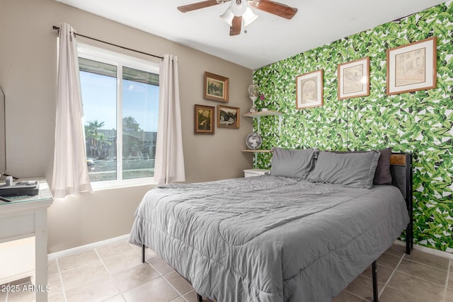 bedroom with light tile patterned floors and ceiling fan