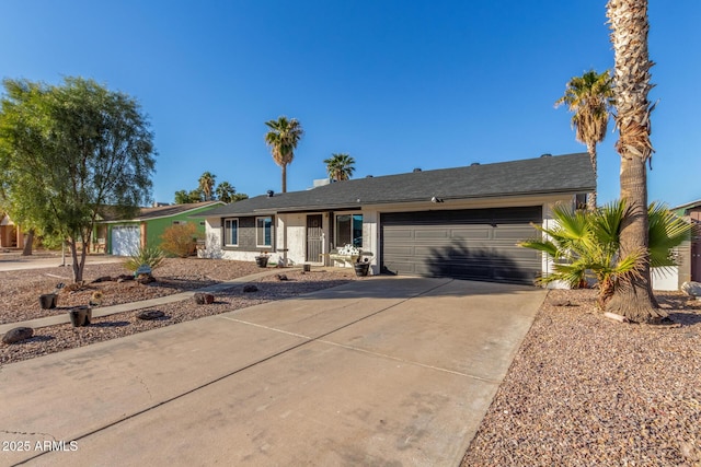 single story home with a garage