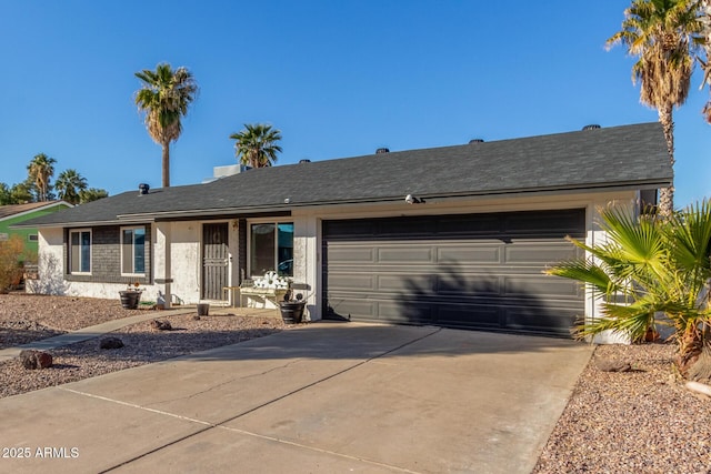 ranch-style home with a garage