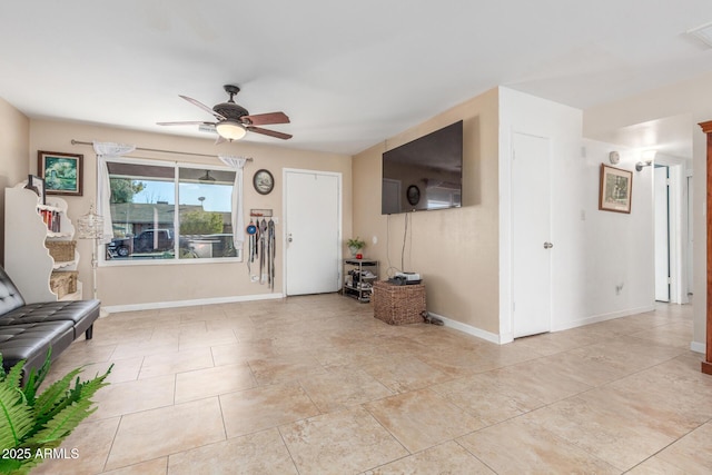 living room with ceiling fan