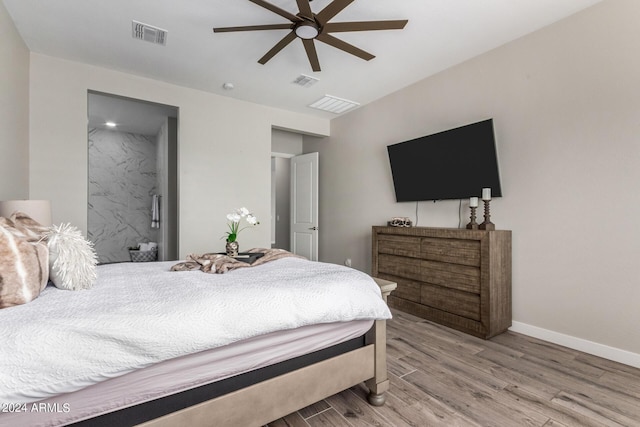 1557 E Flower St, Gilbert, AZ 85298 - bedroom with baseboards, visible vents, ceiling fan, and wood finished floors