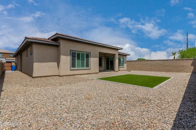 1557 E Flower St, Gilbert, AZ 85298 - back of house featuring a patio area, a fenced backyard, and stucco siding