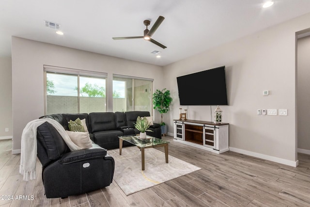 1557 E Flower St, Gilbert, AZ 85298 - living area with visible vents, baseboards, and wood finished floors