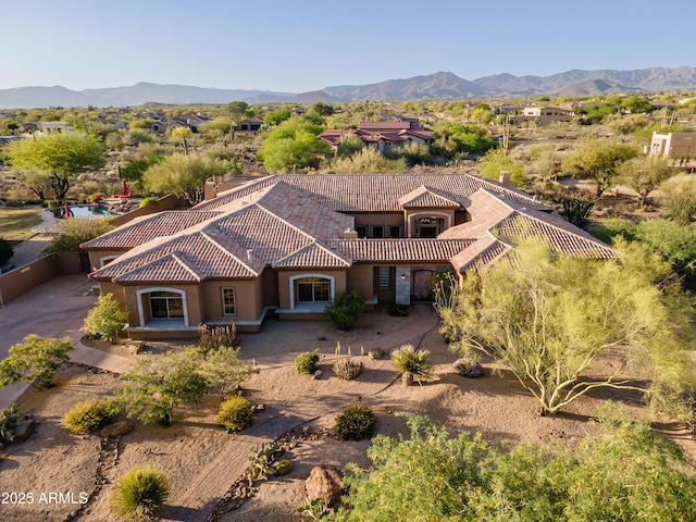 8392 E Eagle Feather Rd, Scottsdale, AZ 85266 - view of front of house featuring a tile roof, a mountain view, and stucco siding