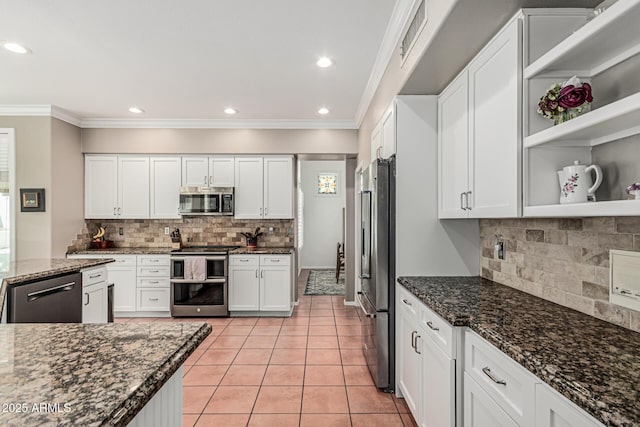 kitchen featuring open shelves, tasteful backsplash, appliances with stainless steel finishes, and ornamental molding