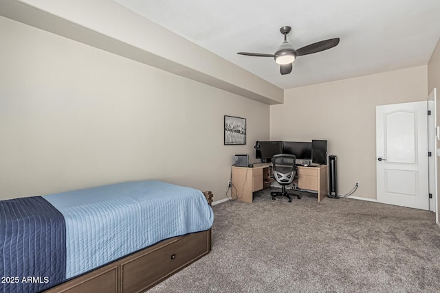 carpeted bedroom with ceiling fan and baseboards