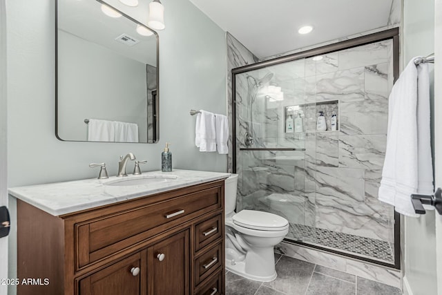 bathroom featuring recessed lighting, visible vents, toilet, vanity, and a marble finish shower