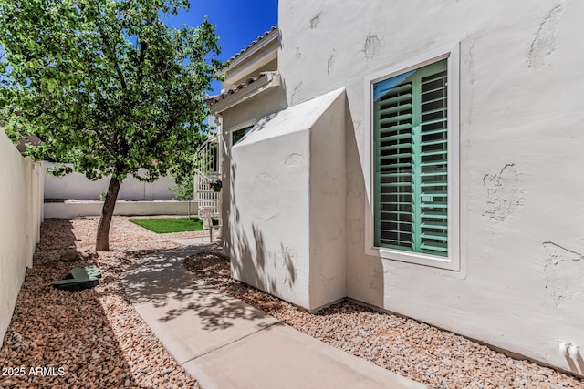 exterior space featuring a fenced backyard
