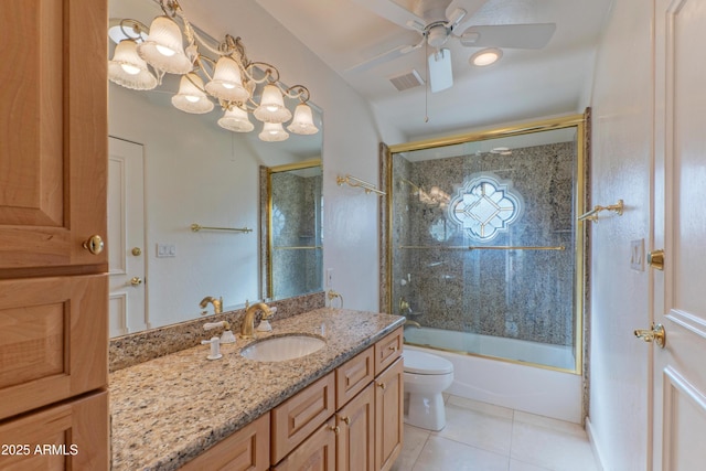 full bath featuring visible vents, toilet, tile patterned flooring, enclosed tub / shower combo, and vanity