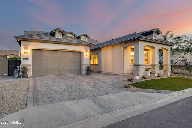 5901 E Sierra Morena St, Mesa, AZ 85215 - view of front of property with a garage, decorative driveway, stucco siding, and a yard