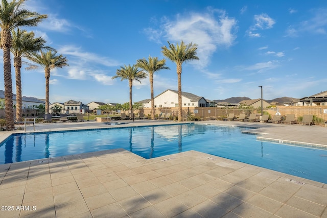 5901 E Sierra Morena St, Mesa, AZ 85215 - pool featuring a patio, fence, and a residential view