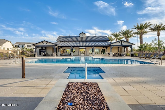 5901 E Sierra Morena St, Mesa, AZ 85215 - pool featuring a community hot tub, a patio area, and fence
