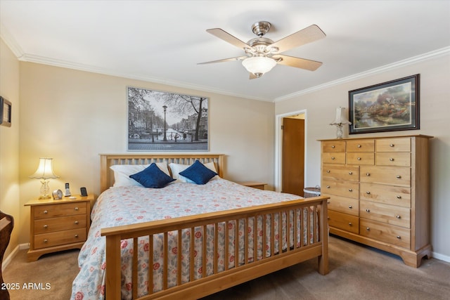 bedroom featuring crown molding, ceiling fan, baseboards, and carpet floors