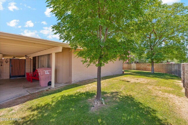 view of yard featuring fence