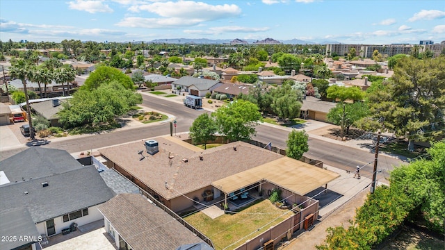 drone / aerial view with a mountain view and a residential view