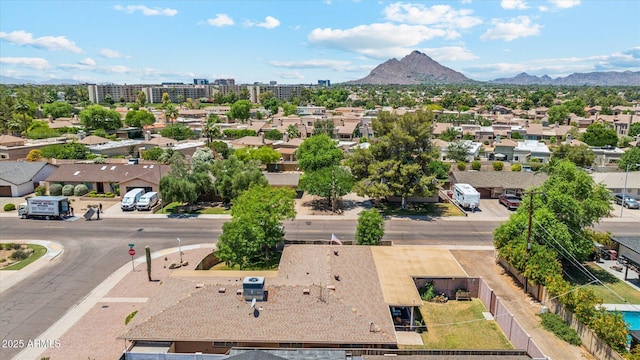 aerial view featuring a mountain view and a residential view