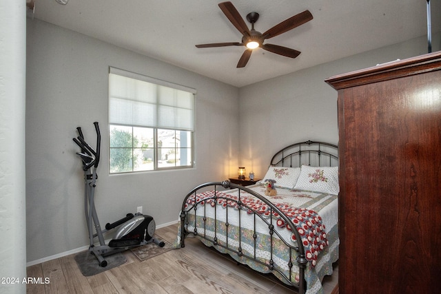 bedroom featuring ceiling fan and light wood-type flooring