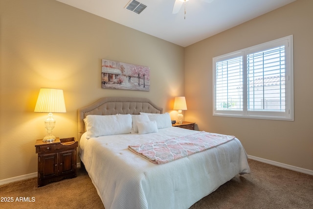 bedroom with carpet, visible vents, and baseboards