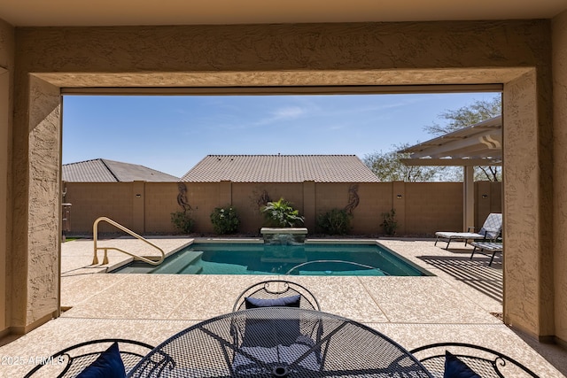 view of swimming pool with a fenced in pool, a patio area, and a fenced backyard