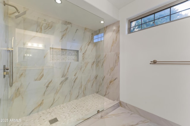 full bath featuring marble finish floor, a marble finish shower, visible vents, and recessed lighting