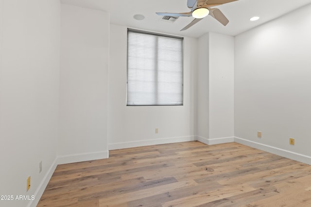 unfurnished room with recessed lighting, visible vents, baseboards, a ceiling fan, and light wood finished floors